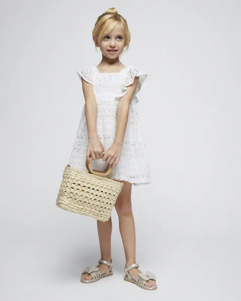 Abito mini bianco in pizzo con spalline e volants 4-8 anni