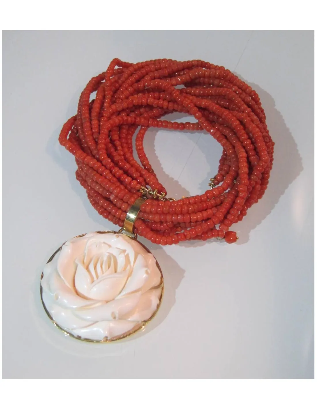 Collana  in corallo rosso naturale con avorio fossile