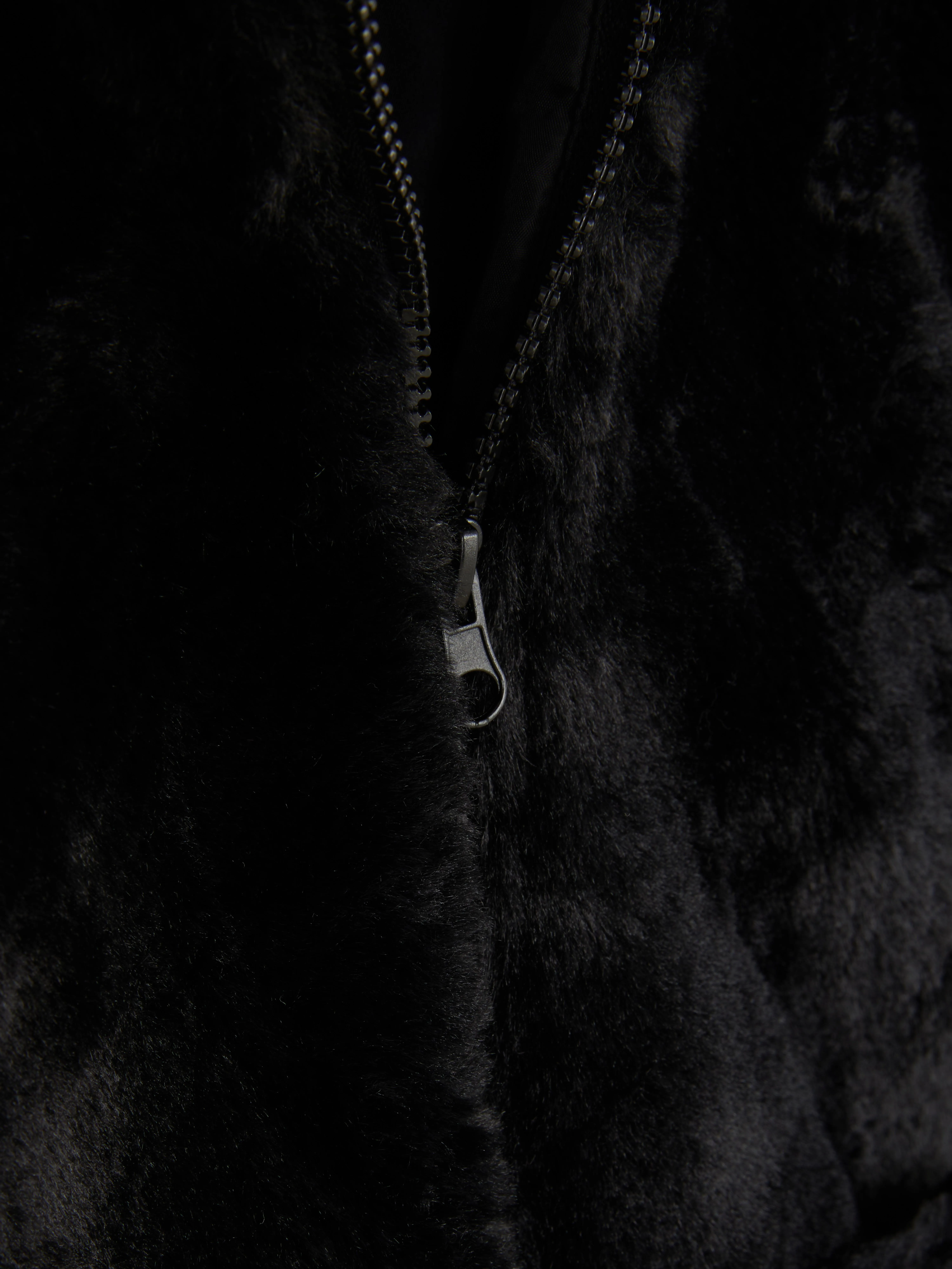 Giacca in pelliccia sintetica con zip