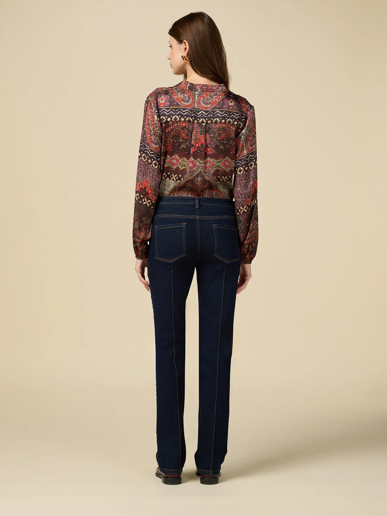 Jeans regular con catene gioiello
