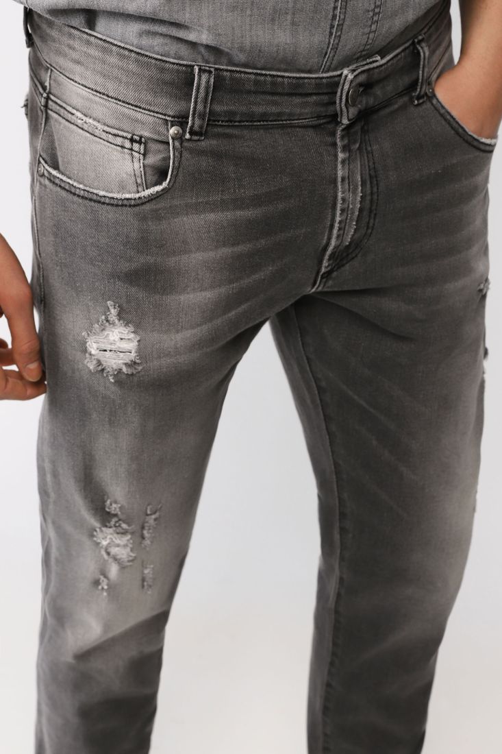 Jeans slim cropped effetto délavé con abrasioni