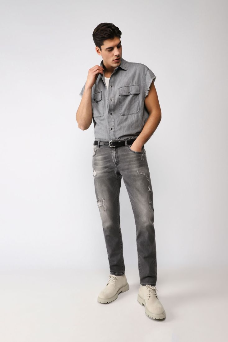Jeans slim cropped effetto délavé con abrasioni