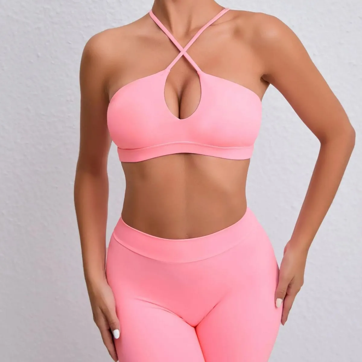 Set da yoga senza cuciture Sport Fitness Sollevamento dell'anca Pantaloni con sensazione di nudo Croce Bellezza Reggiseno poster