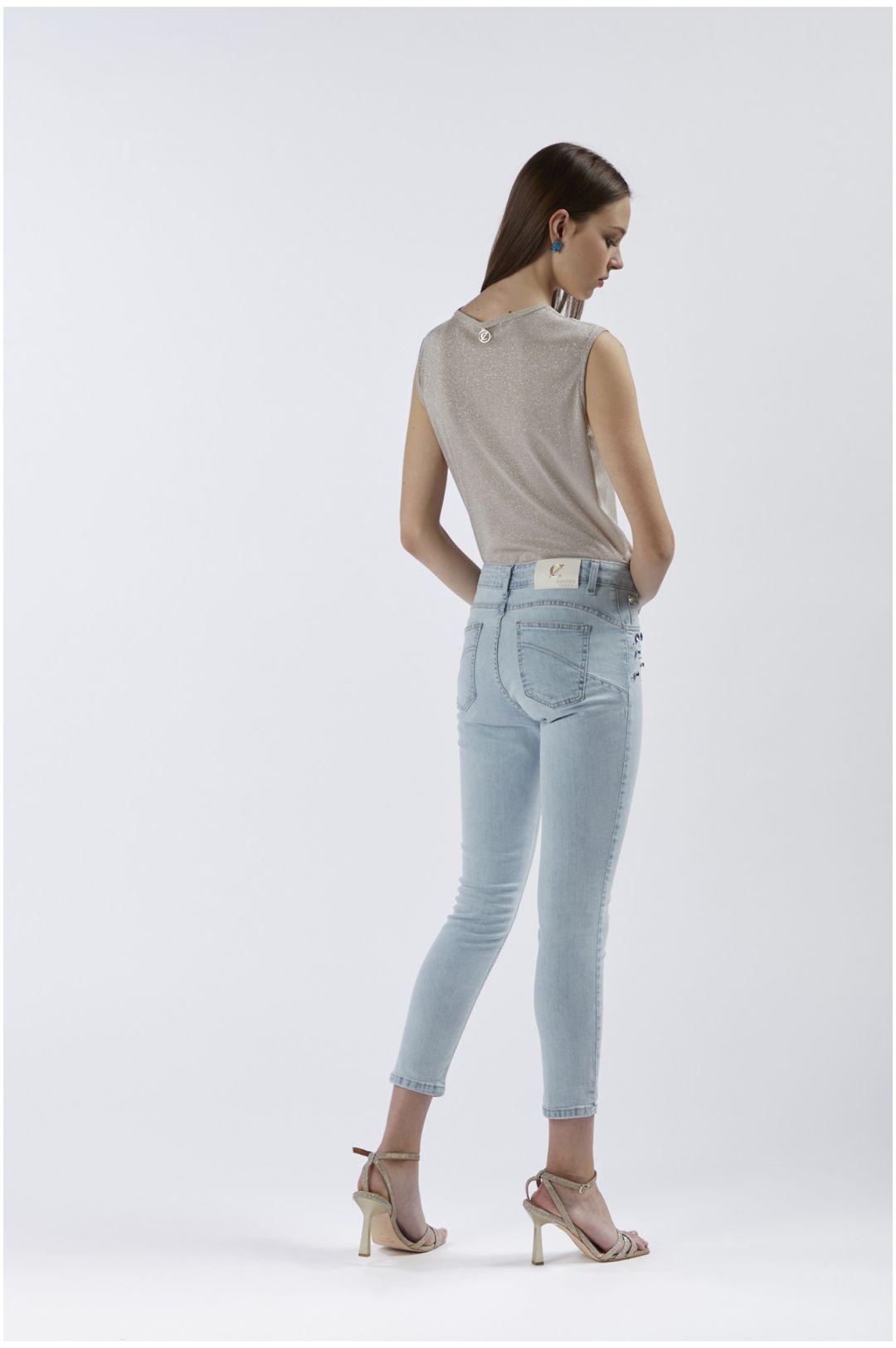 top corto smanicato in jersey con lurex light gold